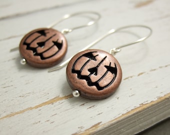 Earrings with Orange Tinted Metal Jack O Lanterns on Handmade Sterling Silver Earring Wires HE-452