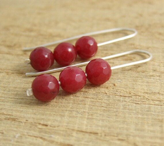 Items similar to Earrings with Three Faceted Ruby Jade Beads on