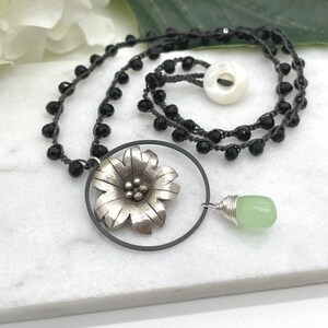 Crocheted Necklace with a Dark Gray Cord, Black Crystal Beads, a Silver Flower, Oxidized Loop and a Green Chalcedony Teardrop SN-597