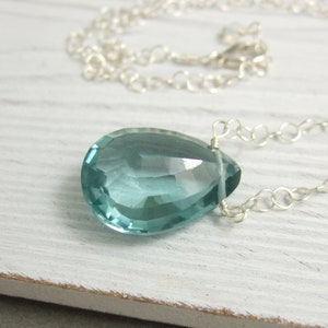 Necklace with a Large, Dark Blue Topaz, Faceted Teardrop on a Medium, Sterling Silver Cable Chain CDN-833