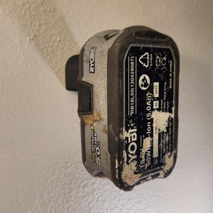 6 pack of Ryobi One Plus battery wall mounts