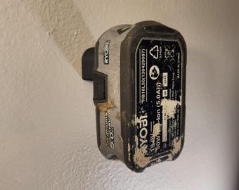 6 pack of Ryobi One Plus battery wall mounts