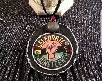 Men or women Unity Celebrate Juneteenth graphic design with  with brown Fist in center for Black unity paper jewelry necklace