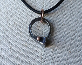 ON SALE - was 46.00 - Annie - Horseshoe nail circle pendant with copper rivet
