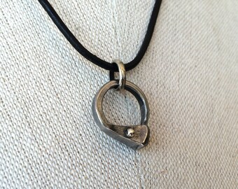 ON SALE - was 48.00 - Annie - Horseshoe nail circle pendant with sterling silver rivet