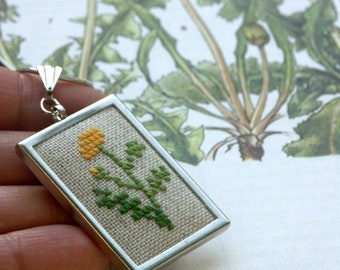 cross stitch embroidered  pendant with  botanical   flower