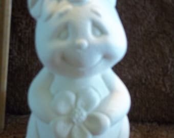Cute Standing Bunny holding a flower made of ceramic bisque and ready to be painted Rabbit Bunnies