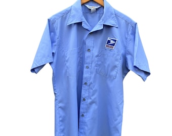 Camisa de uniforme vintage de manga corta para cartero del Servicio Postal de los Estados Unidos (USPS) con la Cruz Voladora.
