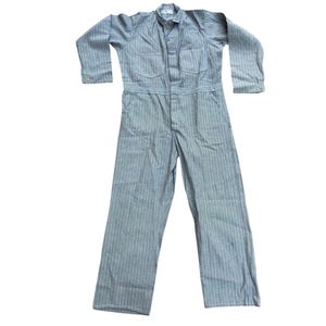 May include: A light blue and white striped jumpsuit with long sleeves, a button-down collar, and two chest pockets. The workwear-style garment has a straight leg and is made of a durable fabric.