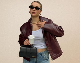 Chic Burgundy Leather Jacket for Women Stylish Oversized Fit Buttoned Design and Pockets Trendy Reverse Collar and Soft Leather