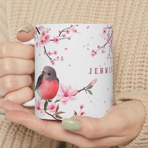 Personalized Cherry Blossom Mug with birts. Custom Name Elegant Watercolor Design. Designed to evoke romance and a sense of tranquility
