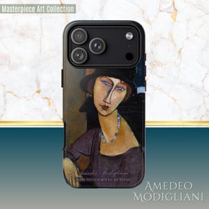 May include: A phone case featuring a portrait of a woman wearing a hat and necklace, with blue eyes. The artwork is a reproduction of Amedeo Modigliani's "Jeanne Hebuterne with Hat and Necklace." The case is labeled "Masterpiece Art Collection."