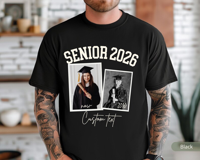 May include: Black t-shirt with the text "SENIOR 2026" in white block letters. Two framed photos of a graduate are below the text. The words "now" and "2010" are below each photo. The words "Custom text" are below the photos.