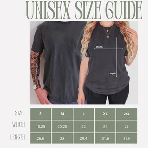 May include: A unisex size guide with measurements for t-shirts. The guide includes sizes S to 2XL, with width measurements ranging from 18.25 to 26 inches and lengths from 26.6 to 31.6 inches. The text "UNISEX SIZE GUIDE" is at the top.