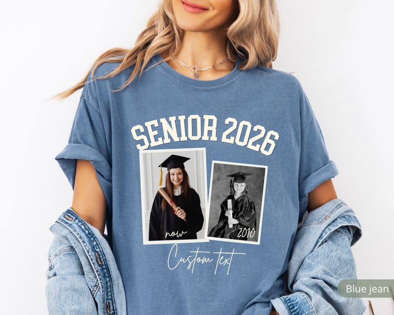 May include: Blue jean-colored t-shirt with the text "SENIOR 2026" in white block letters. Two framed black and white photos are below the text. The shirt also has the words "now" and "Custom text" in script.