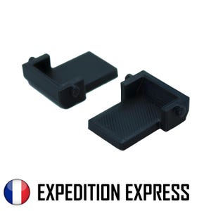 Pode incluir: Duas peças de plástico preto impressas em 3D. As peças são projetadas para serem unidas para criar um objeto maior.