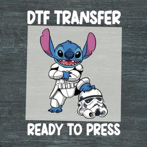 May include: A DTF transfer featuring the character Stitch in a Stormtrooper uniform, holding a Stormtrooper helmet. The image includes the text "DTF TRANSFER" at the top and "READY TO PRESS" at the bottom. The background is a light gray square.