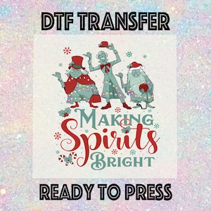May include: DTF transfer design featuring three cartoon characters with holiday attire. The phrase "Making Spirits Bright" is in red and teal script. The words "DTF TRANSFER" and "READY TO PRESS" are in black block letters.