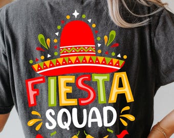 May include: A black t-shirt with a colorful graphic of a sombrero and the text "Fiesta Squad".