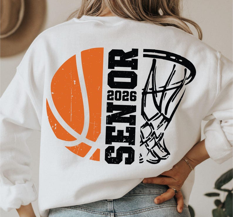 May include: White sweatshirt with a black and orange basketball graphic and the text "SENIOR 2026" on the back.