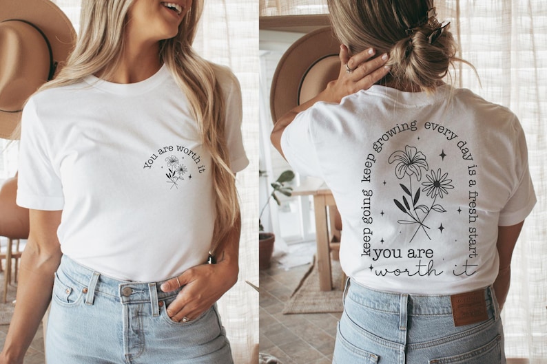 May include: White t-shirt with a floral design and the text "You are worth it" on the front and "Keep going keep growing every day is a fresh start you are worth it" on the back.