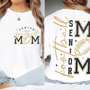 May include: White t-shirt with "Senior Football Mom" text and a football graphic. The back of the shirt features "Love Senior Mom" in gold glitter script, with a football graphic and the words "Senior Mom" in black and gold.
