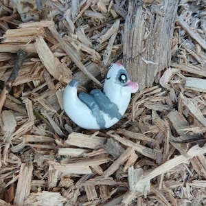 White and Grey baby ferret figurine
