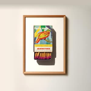 May include: A vintage matchbox with a colorful illustration of a bird and the text "Pacific Islands" and "Qantas Australia's Round-the-World Airline".