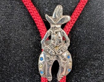 Jeweled Cowboy Bolo Tie – Vintage Western Slide w/ Pistols, Red Cord