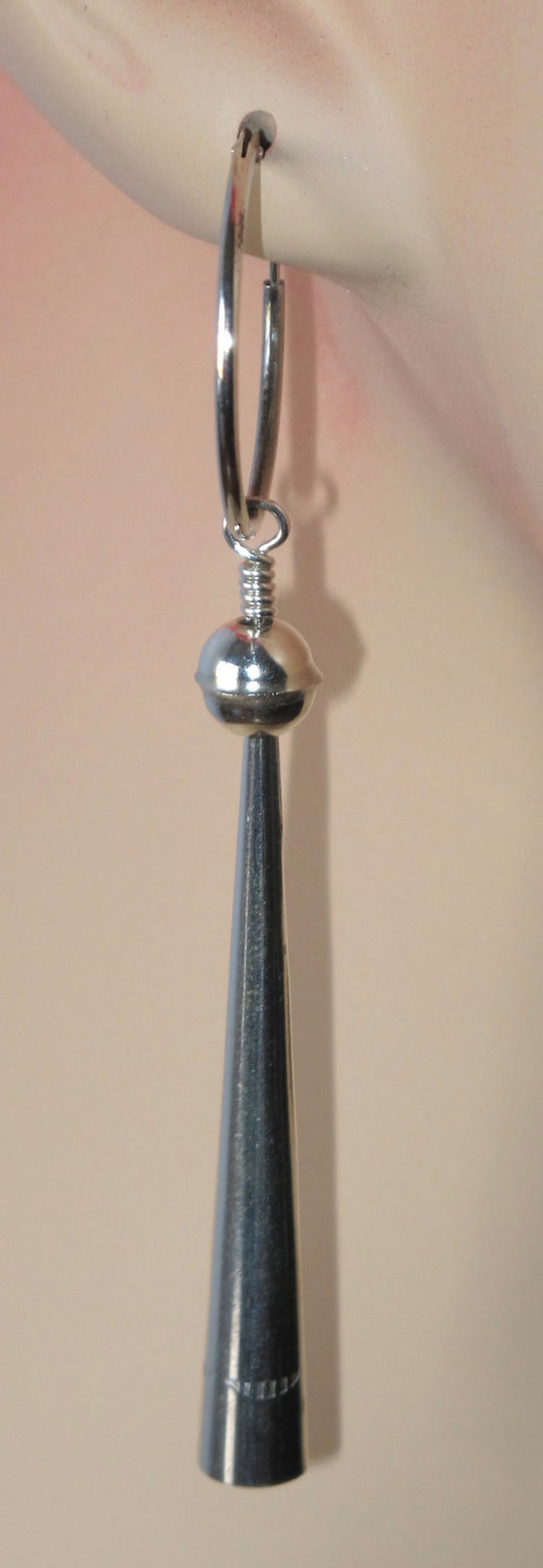 Ball and cone earrings. Etsy
