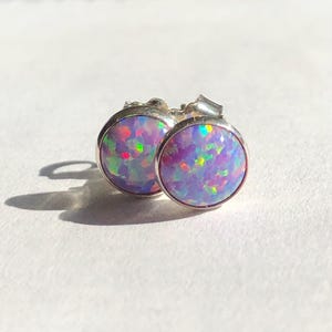 Unicorn purple Opal stud earrings set in sterling silver. Adorable 6mm opal studs. Opal and sterling silver stud earrings. Purple opal studs