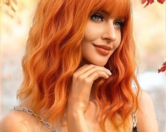 Bright orange short wavy bob with bangs