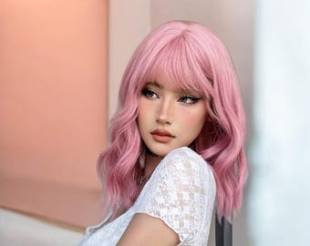 Short wavy pink synthetic wig with bangs