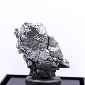 Authentic Campo del Cielo Meteorite: Certified Space Rock Displayed