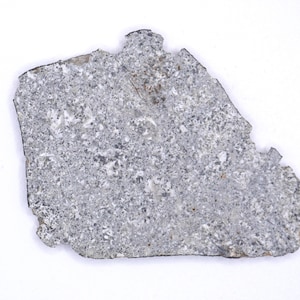 Eucrite Meteorite NWA 7188 — Ancient Crustal Rock from a Differentiated Asteroid