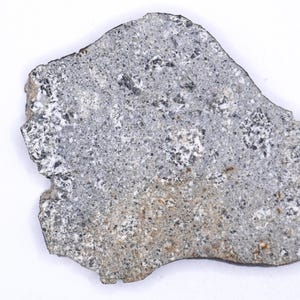 Eucrite Meteorite NWA 7188 — Ancient Crustal Rock from a Differentiated Asteroid