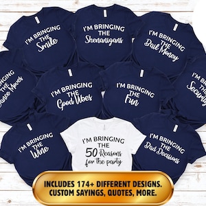 May include: A collection of nine short-sleeved t-shirts in navy blue and white. Each shirt features white or black text reading phrases like I'M BRINGING THE SMILE, SHENANIGANS, BAIL MONEY, DANCE MOVES, GOOD VIBES, FUN, SECURITY, WINE, BAD DECISIONS, and 50 REASONS.