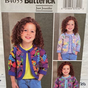 May include: A Butterick sewing pattern featuring a young girl wearing a colorful patchwork jacket. The pattern includes multiple views of the jacket, with the text "B4055 Butterick" and "Just Jennifer" visible.