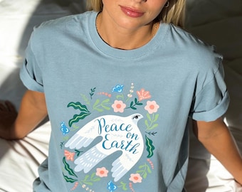 Camiseta "Paz en la Tierra", camiseta "Paloma de la Paz con Flores", camiseta "Paloma Floral", camiseta unisex con símbolo de la paz, camiseta estilo tatuaje espiritual, unisex