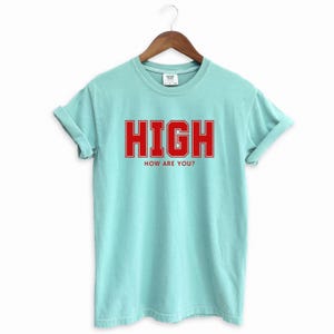 Chalky Mint T-shirt with the text HIGH how are you? in Red College font

HIGH How Are You? Funny Stoner Shirt, Red College Font Tee, Weed Humor Graphic Tee, 420 Shirt, Chill Vibes T-Shirt, Unisex Gift, Cannabis T