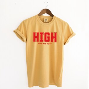 Mustard Yellow T-shirt with the text HIGH how are you? in Red College font

HIGH How Are You? Funny Stoner Shirt, Red College Font Tee, Weed Humor Graphic Tee, 420 Shirt, Chill Vibes T-Shirt, Unisex Gift, Cannabis T