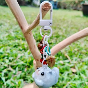 Ezo Flying Squirrel Keychain with Its Favoritesrel Keychain in Its Tree Hollow / cute flying Squirrel / animal lovers / Squirrel lover