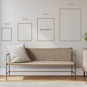 a living room with a beige sofa and a wooden dresser. Above the sofa, there are four framed pictures of different sizes, indicating the dimensions of the pictures. The largest picture is 24x36, followed by 18x24, 16x20, and 12x16. The smallest picture is 12x16. The sofa has a white pillow on it. The dresser has a vase of flowers on top.