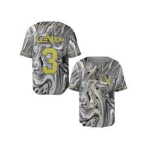 May include: A short-sleeve baseball jersey featuring a black, white, and gray marble pattern. The back displays the text ILLENIUM above the number 3 in gold. The front features a gold phoenix logo on the chest, a button-down placket, and gold trim.