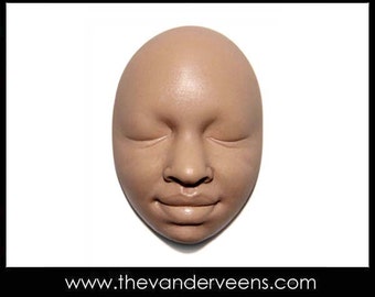Mold No.77 (Face- African looking with closed eyes) by Veronica Jeong