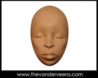 Mold No.47 (Face- African looking with closed eyes) by Veronica Jeong