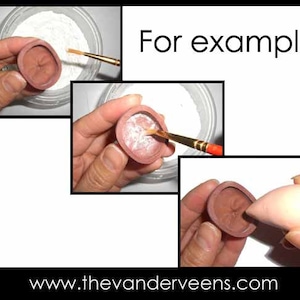 May include: Close-up of a hand applying white powder to a brown clay mold with a brush. The text "For example" is visible in the background.