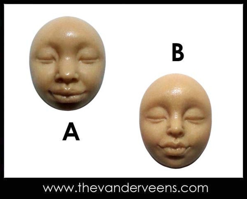 May include: Two round, beige-coloured, ceramic sculptures of faces with closed eyes. The sculptures are labelled A and B.