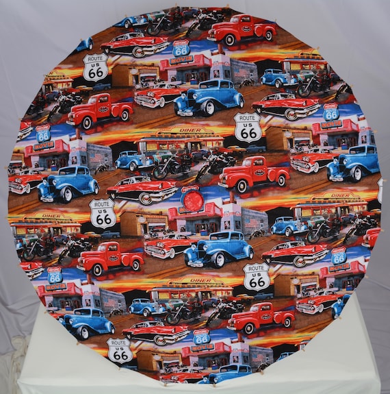blue and red roadsters parasol