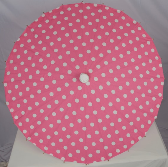 Pink with white polka dots parasol